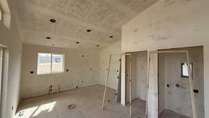 Misc room featuring lofted ceiling