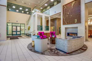 Community lobby with a high ceiling and recessed lighting
