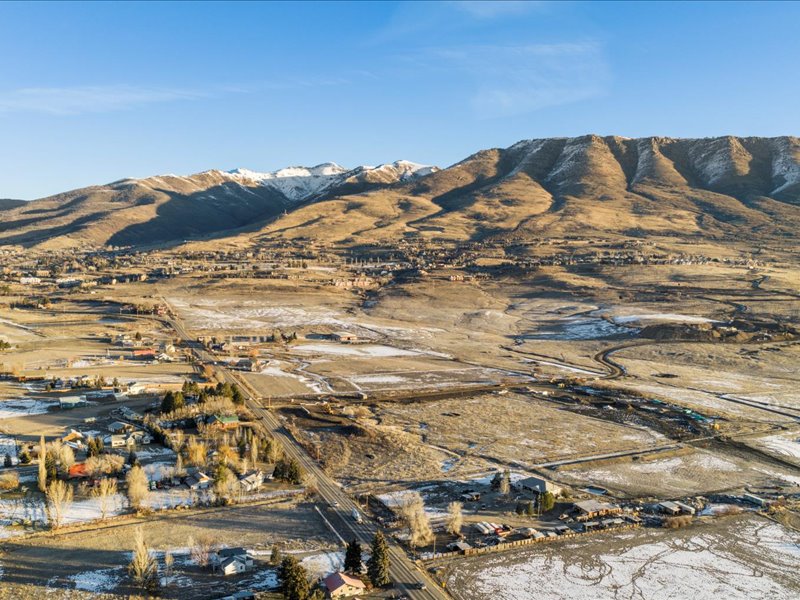 View of mountain backdrop featuring rural landscape