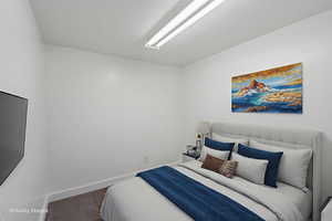 Bedroom with baseboards