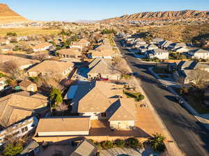 Aerial view of residential area featuring a mountainous background