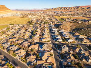 Aerial view of residential area featuring mountains