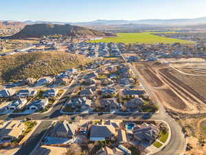 Aerial view of residential area featuring mountains