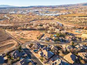 View of property location with mountains and nearby suburban area
