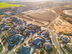 Aerial overview of property's location featuring nearby suburban area