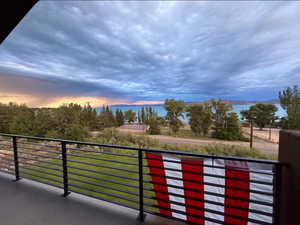 Balcony at dusk with a patio