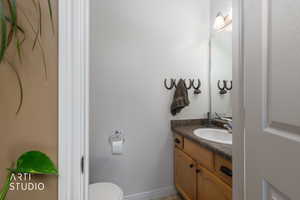Bathroom with vanity and toilet