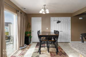 Dining room featuring a chandelier