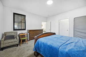Bedroom with carpet flooring