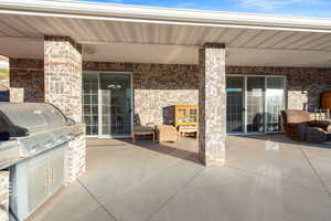 View of patio / terrace featuring area for grilling and french doors