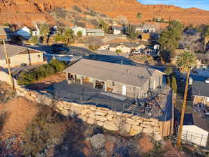 Aerial view of residential area featuring a mountainous background
