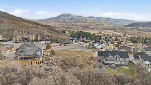 Aerial view of residential area with mountains