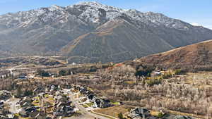 View of mountain backdrop with nearby suburban area