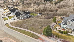 Aerial overview of property's location with nearby suburban area