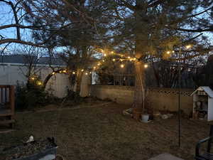 View of fenced backyard