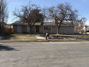 View of front of property featuring brick siding