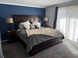 View of carpeted bedroom