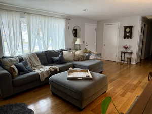 Living area featuring light wood-style floors