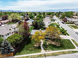 Aerial view of residential area with a mountainous background