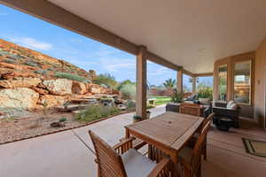 View of patio with an outdoor living space and outdoor dining space