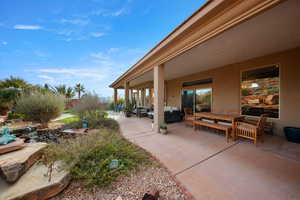 View of patio featuring an outdoor hangout area and outdoor dining area