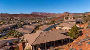 Aerial view of residential area with a mountain backdrop