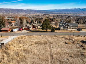 View of mountain backdrop with nearby suburban area