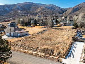 View of mountain backdrop with nearby suburban area