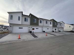 2 car garage and additional parking in the driveway