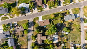 Aerial overview of property's location featuring nearby suburban area