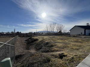 View of yard with a view of countryside