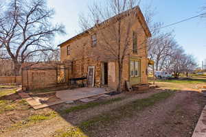 Back of property with a patio area