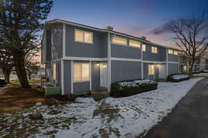View of front of property featuring a chimney