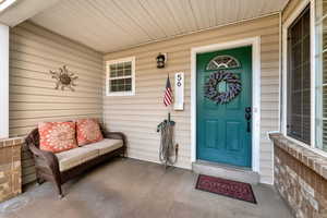Entrance to property with covered porch