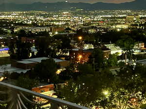 City view with a mountainous background and a view of city lights