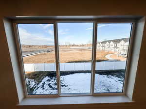 View out of the Primary Bedroom Window overlooking landscaped common area