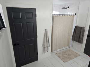 Bathroom with a shower stall