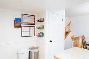 Kitchen pantry with chair rail trim.