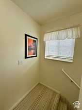 Stair landing with south window