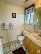 Bathroom with vanity and a shower