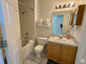 Bathroom with vanity,  shower-jetted tub combination