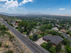 View of property location with a mountainous background and nearby suburban area