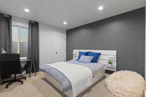 Carpeted bedroom featuring recessed lighting