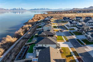 Aerial view of residential area with a water and mountain view