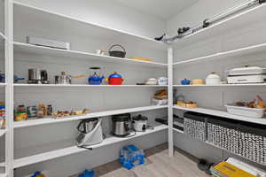 Pantry with an AC wall unit