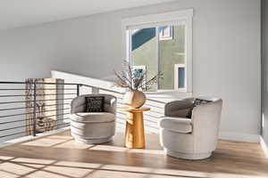 Detailed view of wood finished floors and baseboards