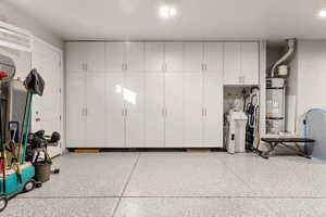 Garage with strapped water heater