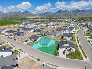 Aerial view of residential area with a mountain backdrop