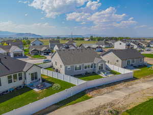 Aerial perspective of suburban area featuring mountains