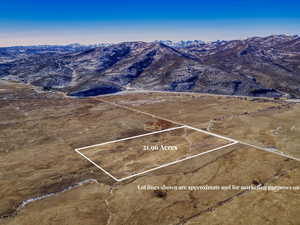 View of mountain background featuring rural landscape